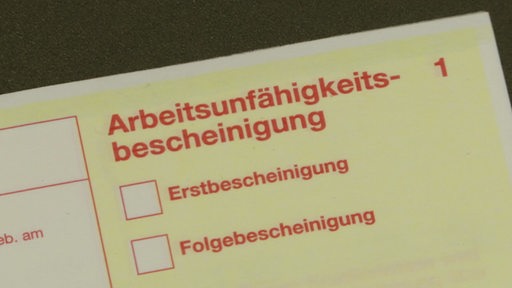 Eine Arbeitsunfähigkeitsbescheinigung.