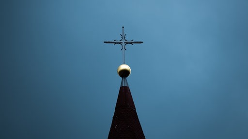 Das Kreuz einer  Kirche.