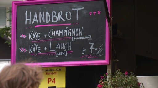 Preistafel von einem Handbrot-Stand auf der Breminale