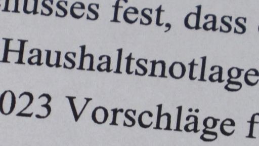 Haushaltsnotlage in einem Text niedergeschrieben. 