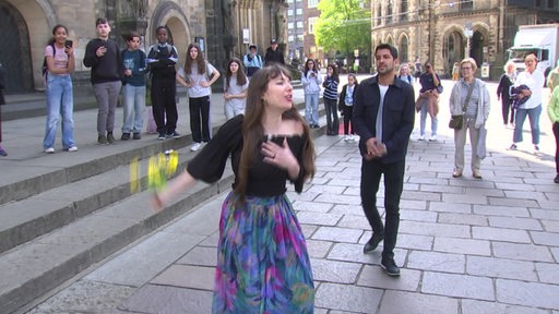 Die Strassenmusiker Mailen Bilezker und Murilo Sousa in der Innenstadt