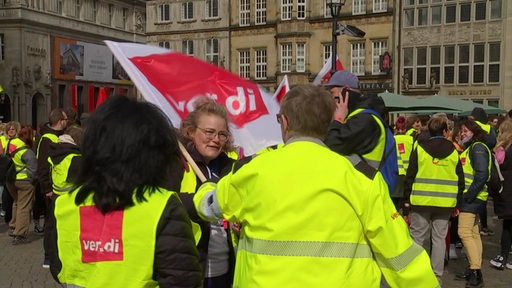 Beschätigte auf einer Demonstration 